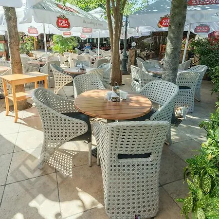 Апартамент In Central Plaza